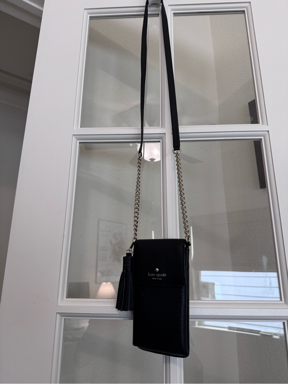 kate spade black pebbled leather crossbody phone pouch with tassel